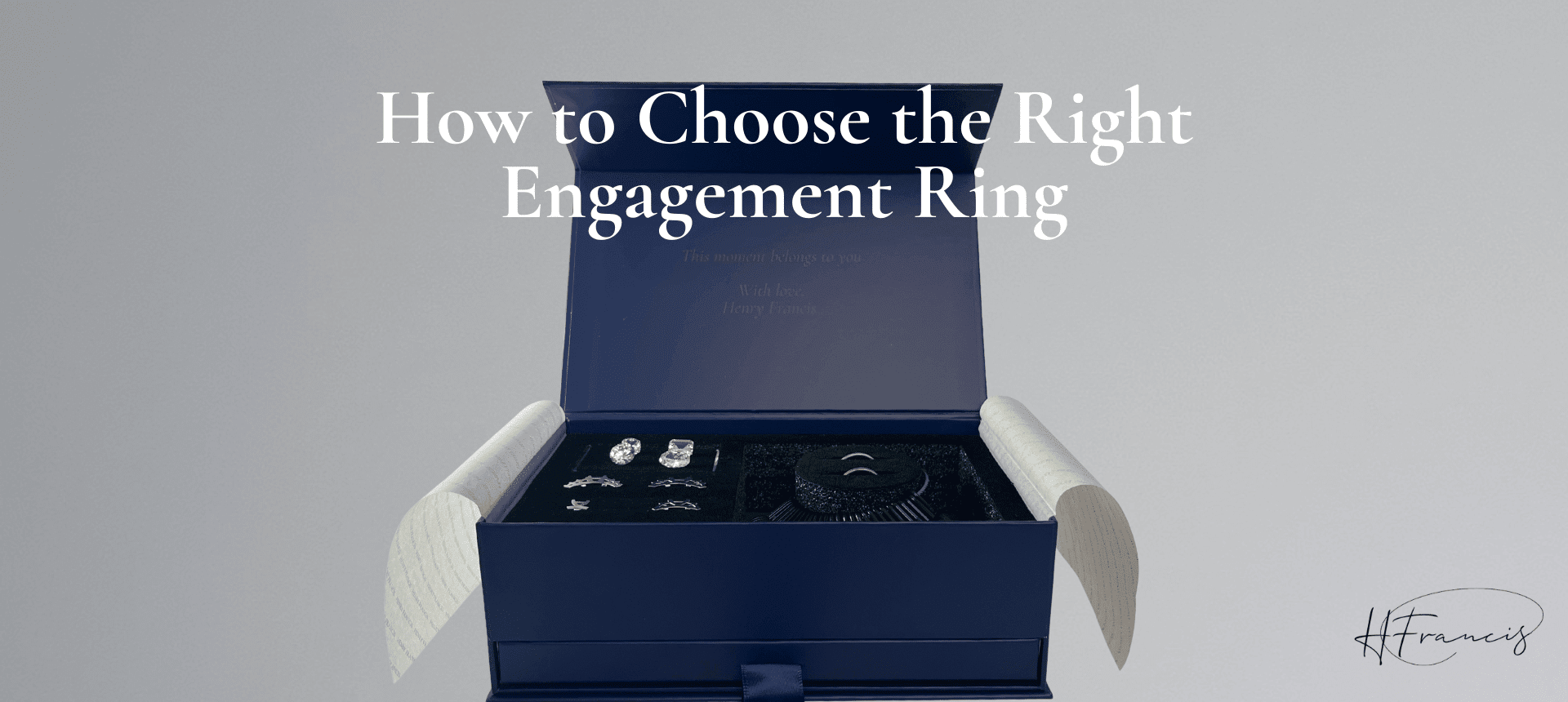 Navy jewelry box with ring and loose stones; visible text: How to Choose the Right Engagement Ring