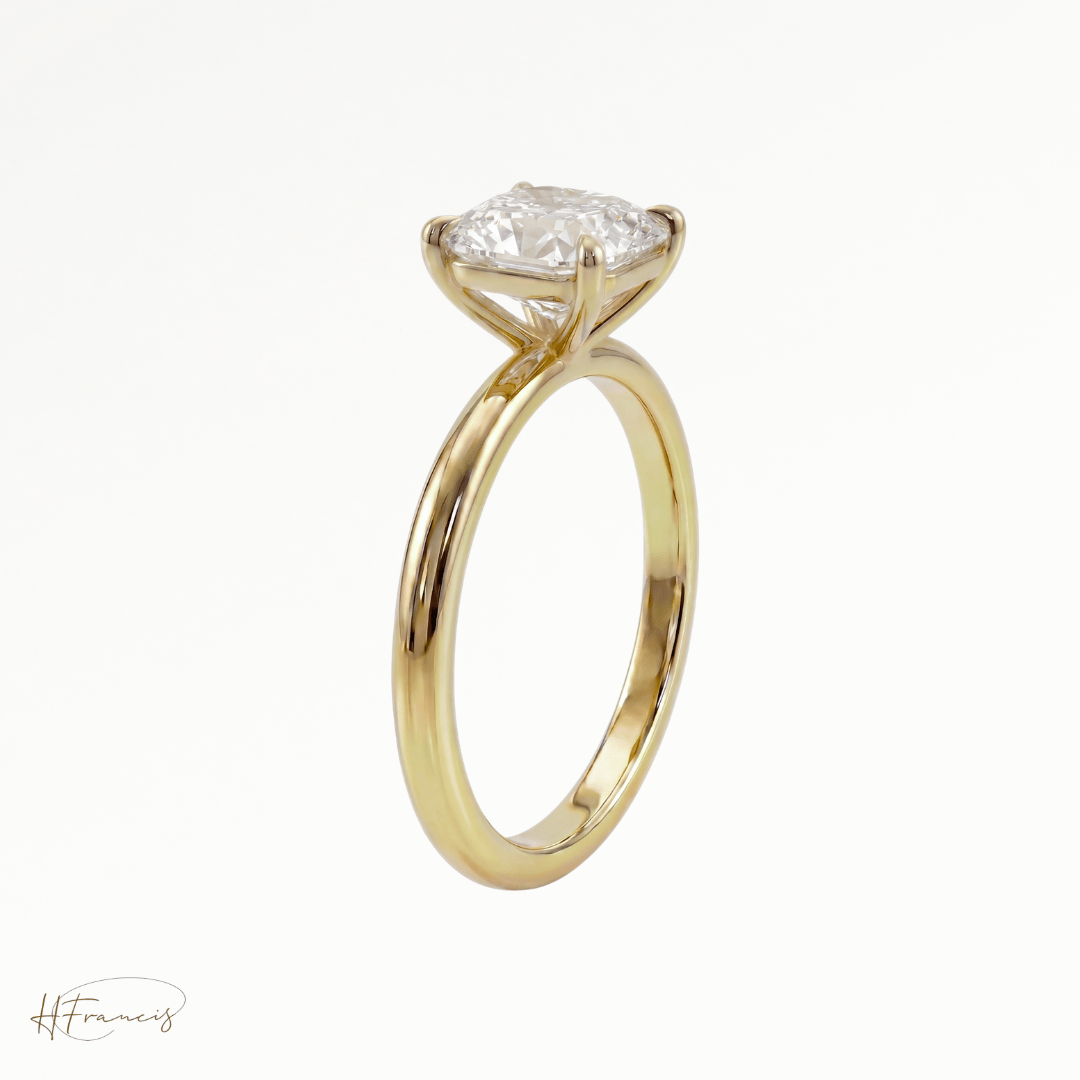 Cushion classic solitaire engagement ring in 18k yellow gold side view 