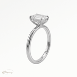 Emerald classic solitaire engagement ring in Platinum 