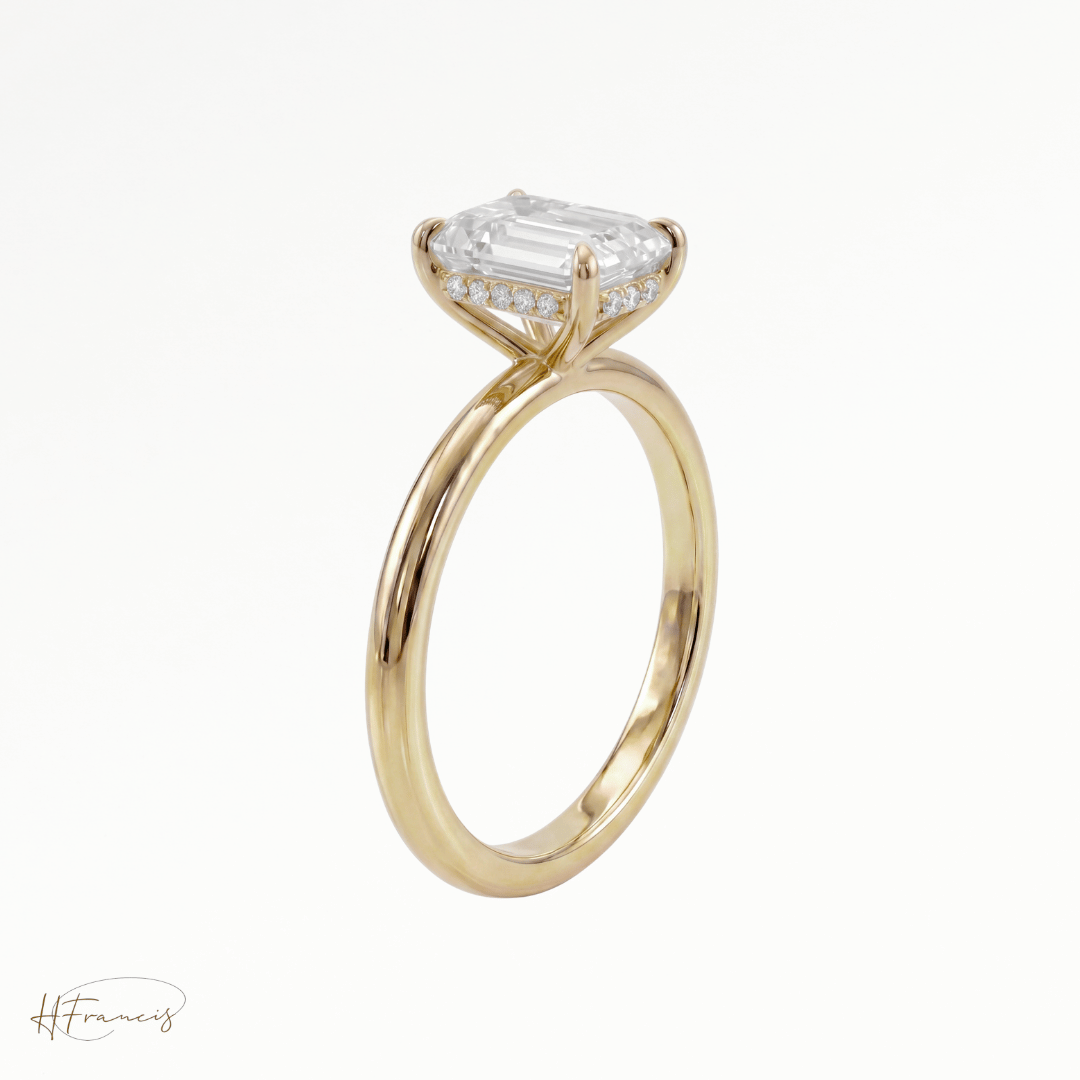 Emerald classic solitaire engagement ring in 18k yellow gold 