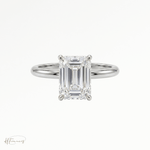 Emerald classic solitaire engagement ring in Platinum 