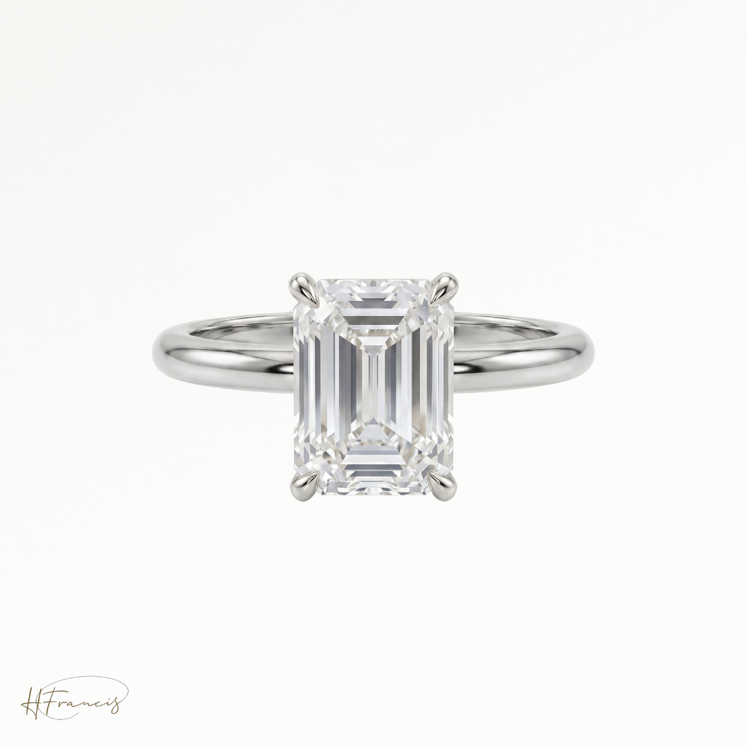 Emerald classic solitaire engagement ring in Platinum 