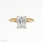 Emerald classic solitaire engagement ring in 18k yellow gold 
