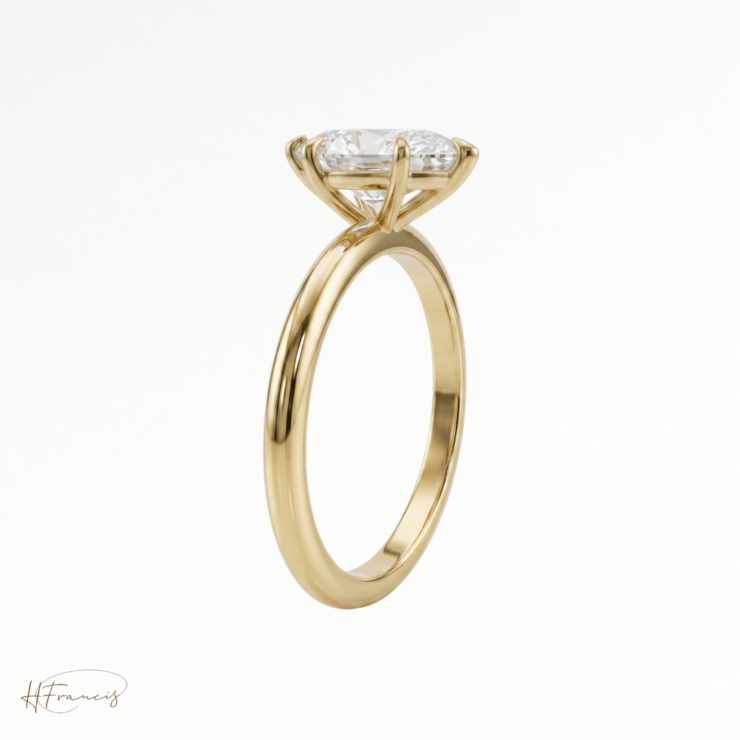 Marquise classic solitaire engagement ring in 18k yellow gold side view 