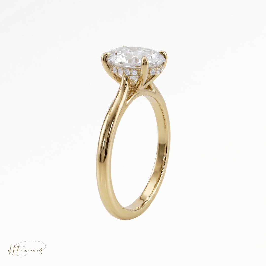 Oval Cathedral Hidden Halo solitaire engagement ring in 18k yellow gold 