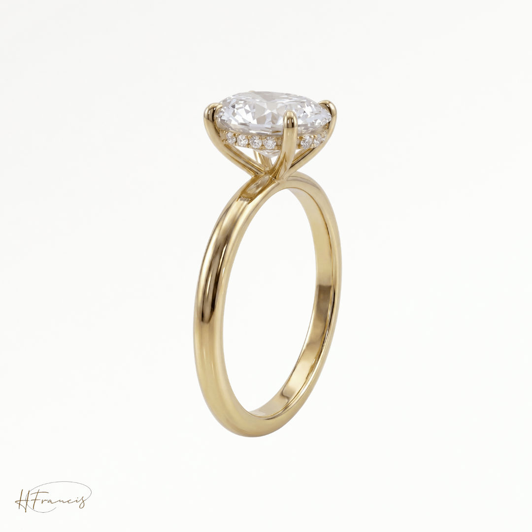 Oval classic solitaire engagement ring in 18k yellow gold 