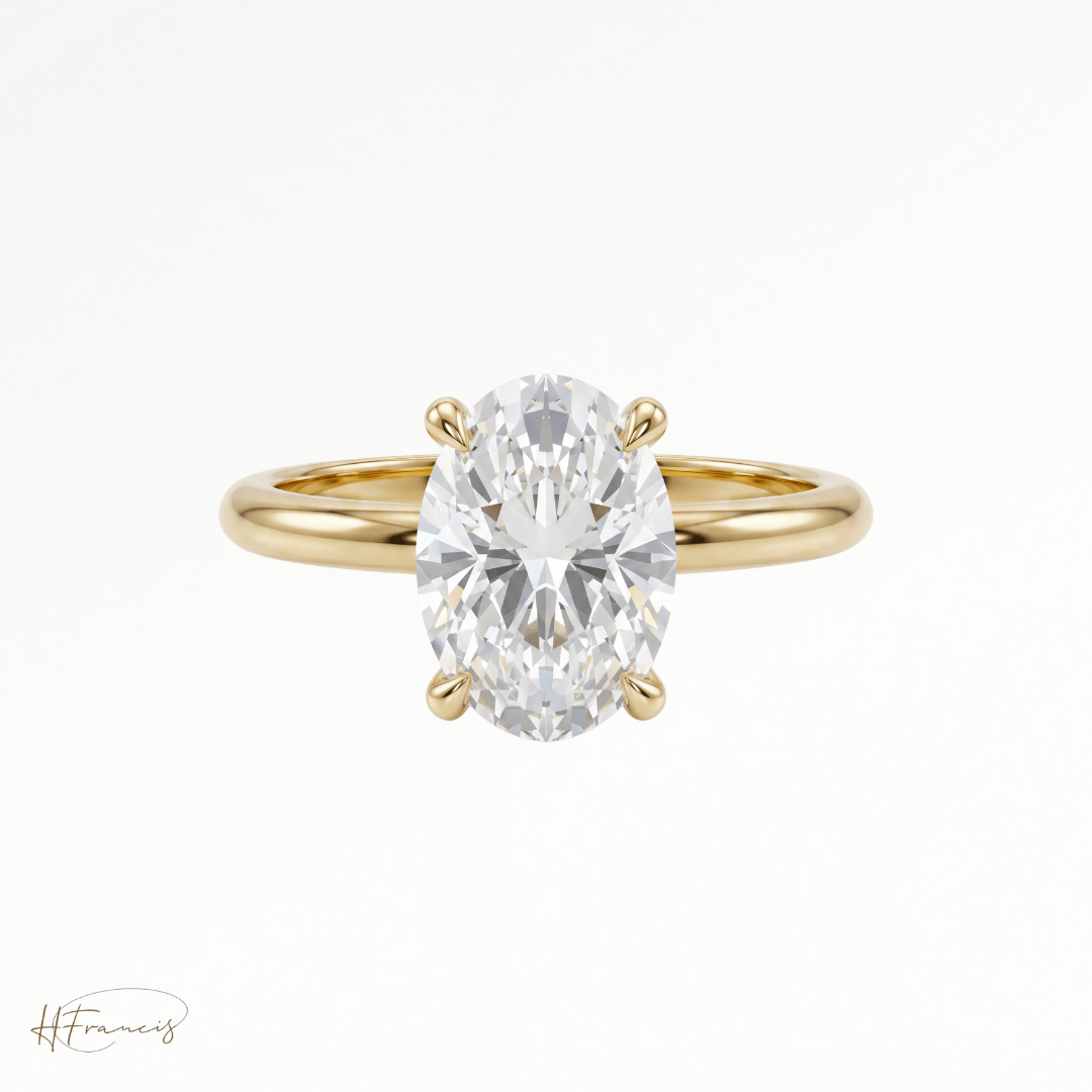 Oval classic solitaire engagement ring in 18k yellow gold 