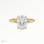 Oval classic solitaire engagement ring in 18k yellow gold 