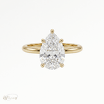 Pear classic solitaire engagement ring in 18k yellow gold 