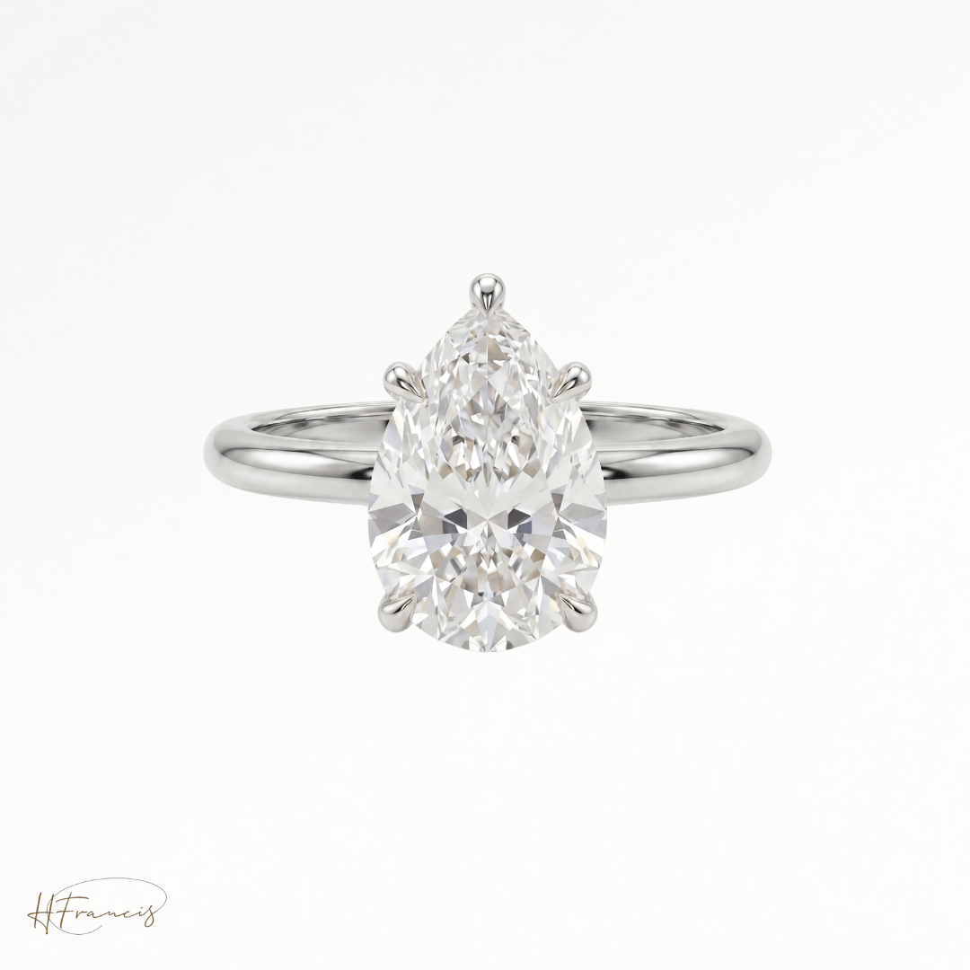 Pear classic solitaire engagement ring in Platinum 