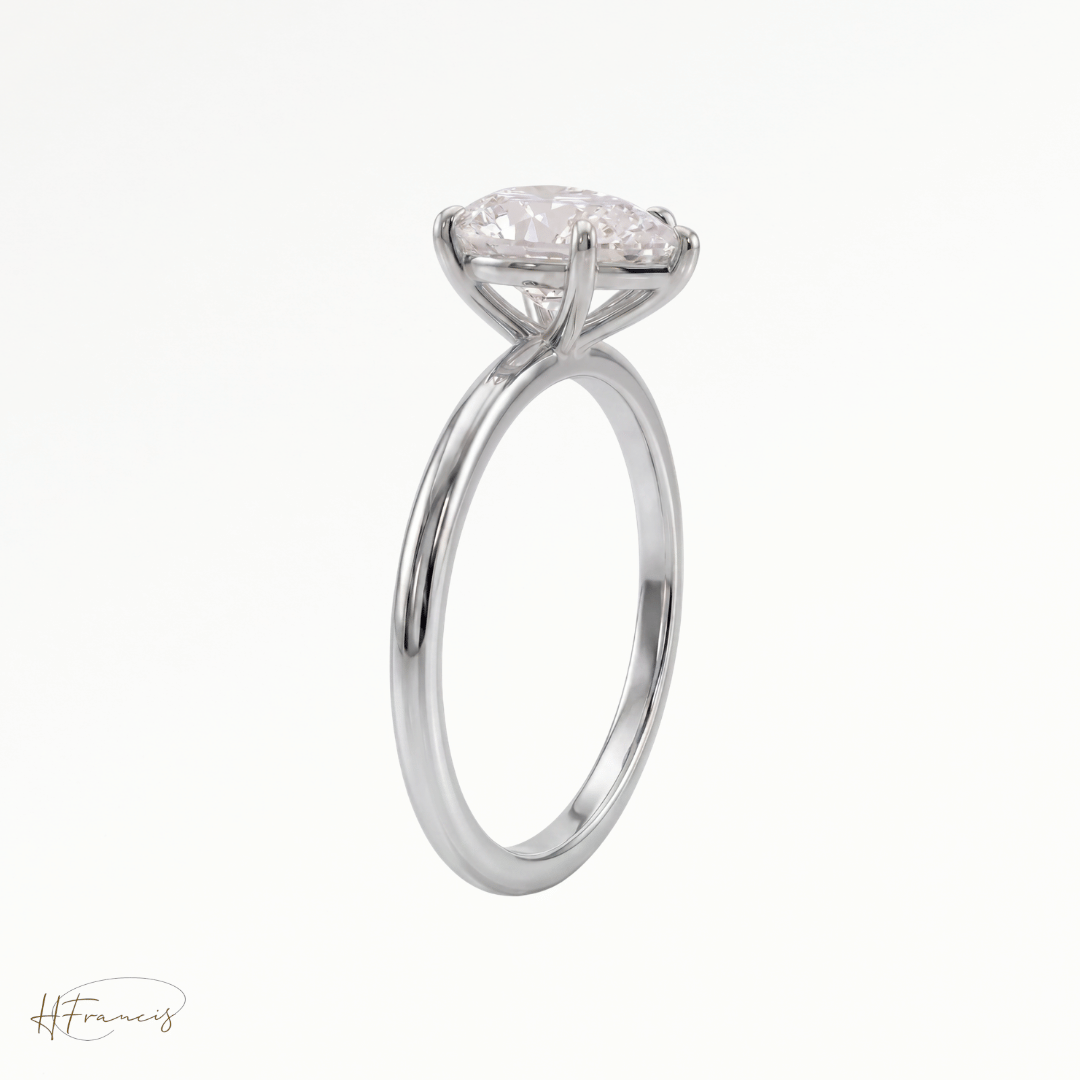 Pear classic solitaire engagement ring in Platinum 