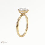 Pear classic solitaire engagement ring in 18k yellow gold side view 