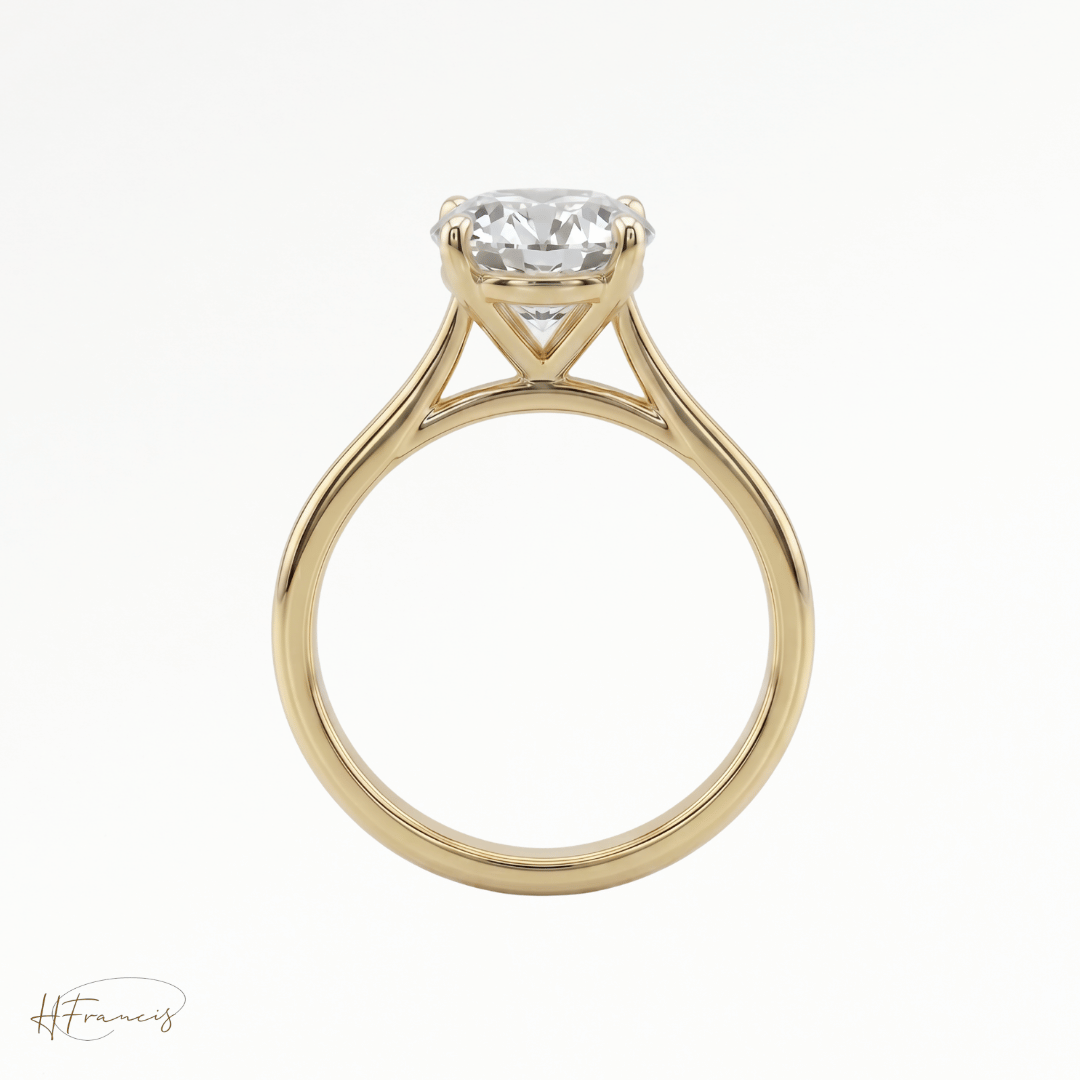 Round Cathedral solitaire engagement ring in 18k yellow gold 