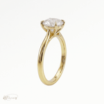Round Cathedral solitaire engagement ring in 18k yellow gold 