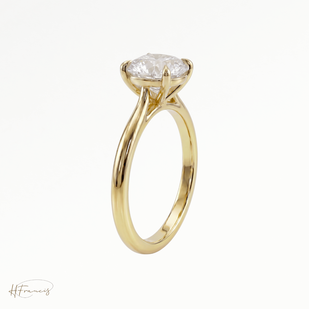 Round Cathedral solitaire engagement ring in 18k yellow gold 