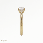 Round classic solitaire engagement ring in 18k yellow gold side profile 