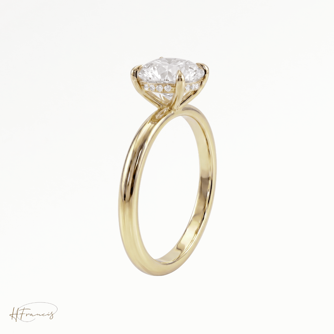 Round classic solitaire engagement ring in 18k yellow gold 