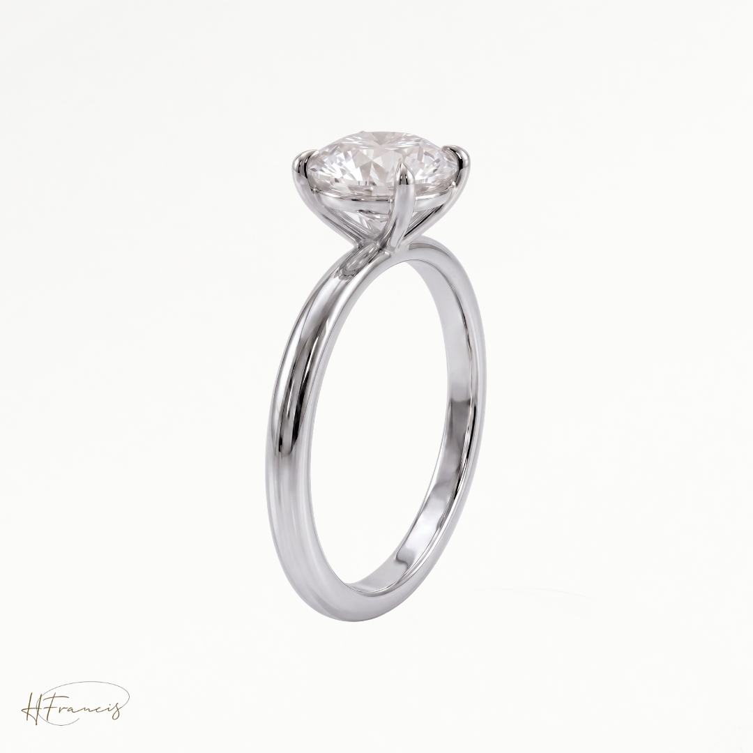 Round classic solitaire engagement ring in Platinum 