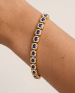 Oval Sapphire Halo Bracelet worn on the wrist