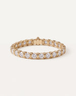 Dual Rail Diamond Tennis Bracelet in 14k yellow gold, fastened in a circle, round diamonds in four prongs with paired gold bars between each stone