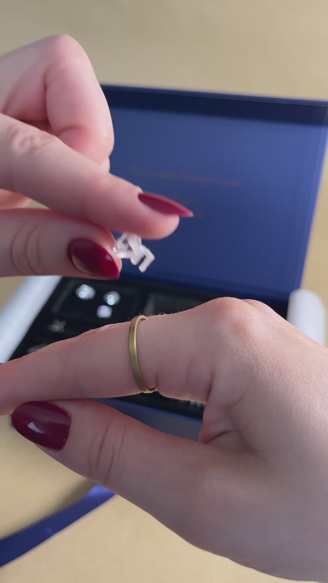 Video preview showing a hand holding a ring during a try-on demonstration